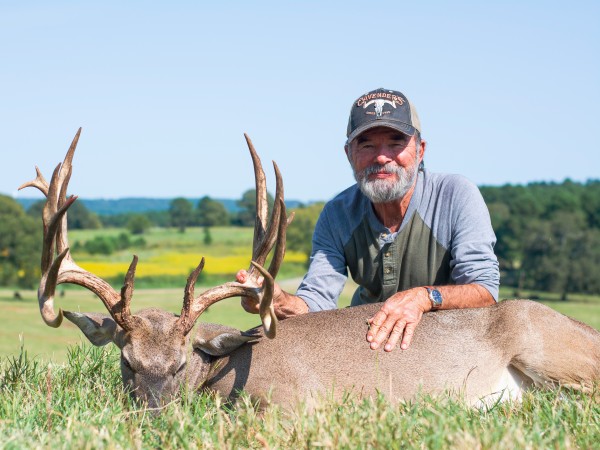 Hunter with Trophy Buck Whitetail Deer